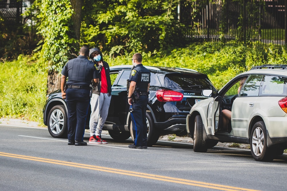police officers speaking with a driver